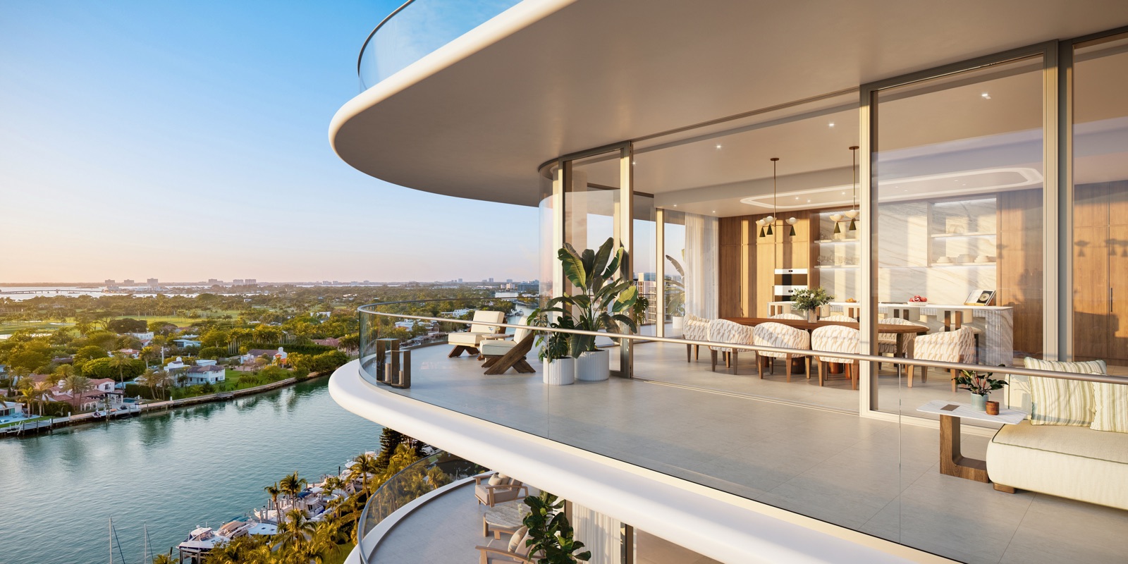 The Perigon penthouse kitchen — Tara Bernerd custom design, honed marble counters and backsplash, Sub-Zero and Wolf appliances.