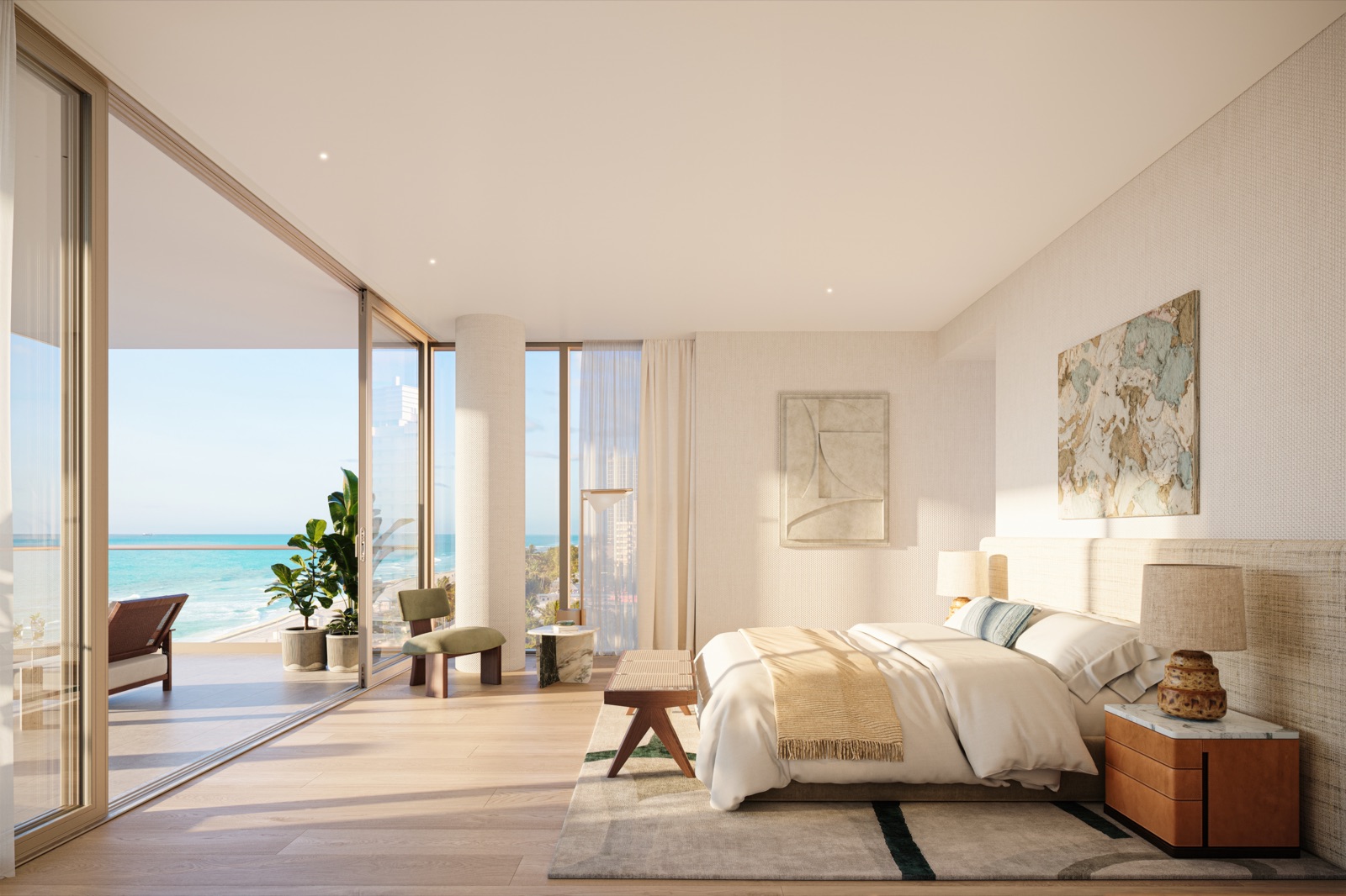 Primary suite at The Perigon Miami Beach — floor-to-ceiling windows, custom millwork, ocean views.